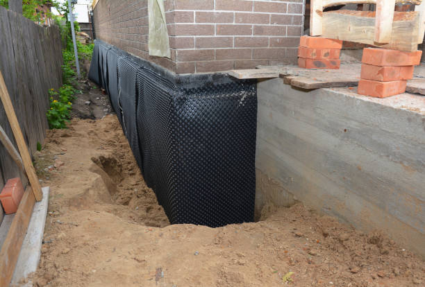 Happy homeowners after waterproofing job in Sadieville